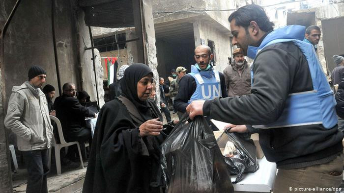 عمال إغاثة في سوريا (DPA)