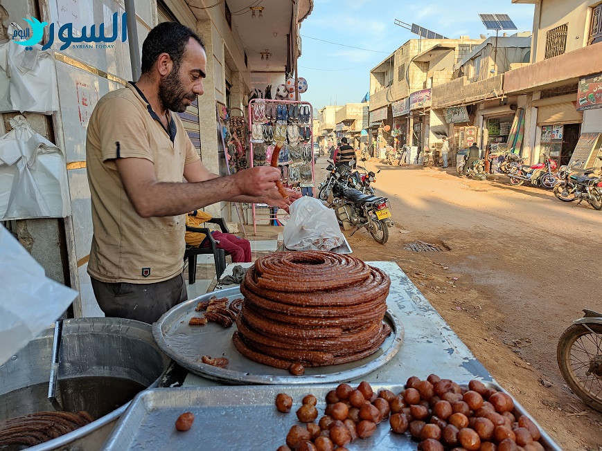 أحد أسواق مخيم أطمة (شام المحمد)