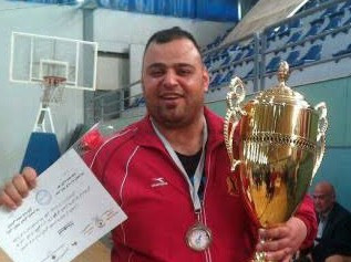 بطل المصارعة الراحل علاء عزام