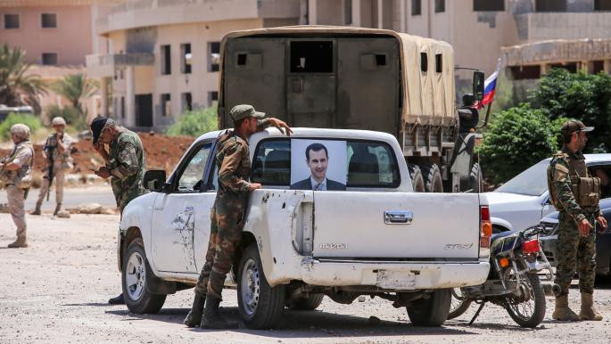 لجان تسويات في محافظة درعا (AFP)