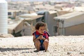 طفل سوري لاجيء في مخيم في لبنان