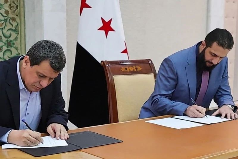من توقيع الاتفاق بين مظلوم عبدي والرئيس السوري أحمد  الشرع/ ارشيف