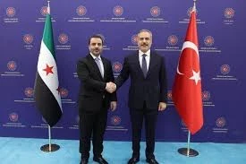 وزير خارجية تركيا هاكان فيدان ووزير الخارجية السوري أسعد الشيباني