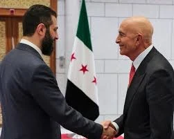 الرئيس احمد الشرع والمبعوث االامريكي توماس باراك