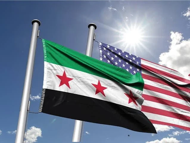 العلم السوري والعلم الامريكي
